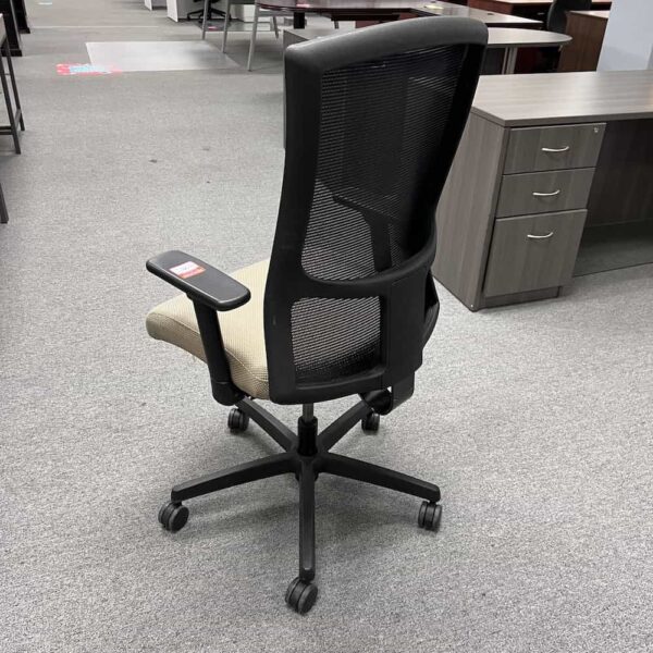 tan and black task chair with mesh back