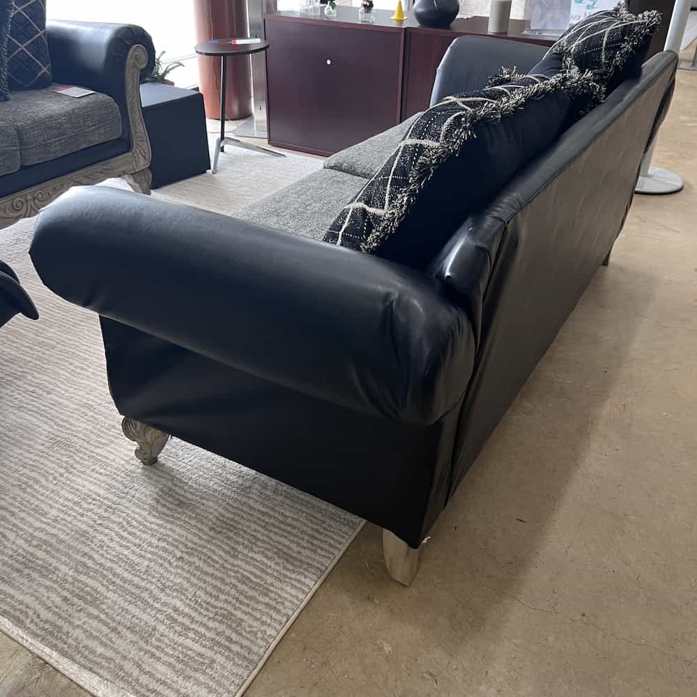two tone black and beige vinyl and upholstery scroll arm sofa couch