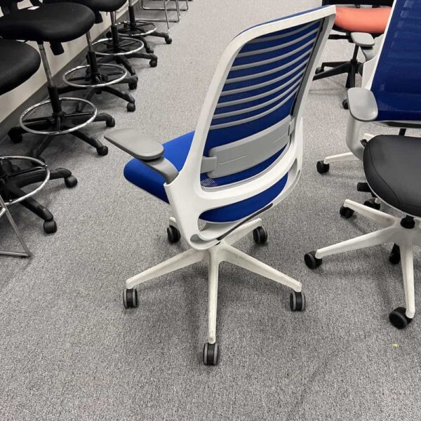 blue mesh back task chair with grey and white base steelcase series 1 used