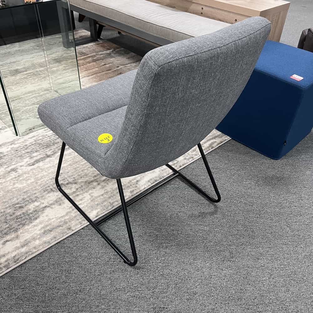 new grey upholstered plush sutton chair modern lounge with black wire legs