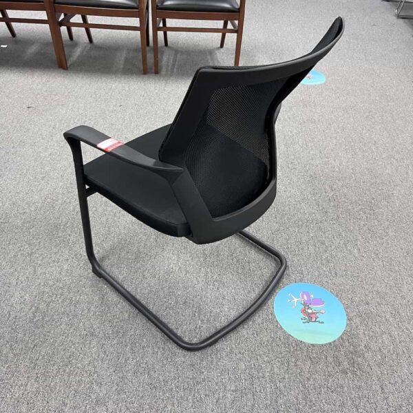 black mesh back guest chair with sled base and upholstered seat