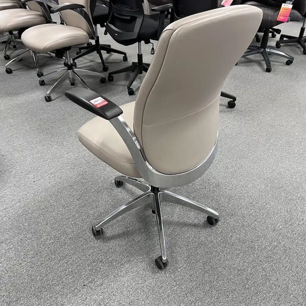 Taupe vinyl aurora knee tilt mid back aluminum office chair used national