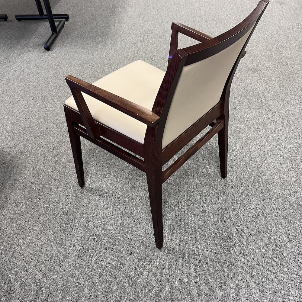 walnut veneer wood frame chair with arms and beige leather seat and back