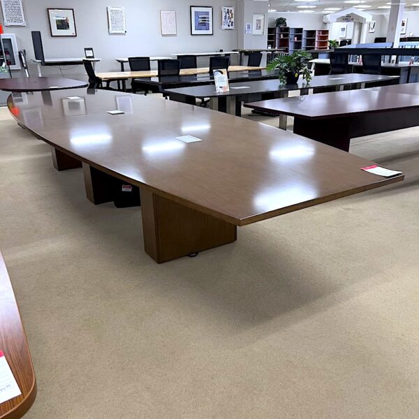 16 foot walnut veneer boat shaped conference table with silver cord ports used OFS