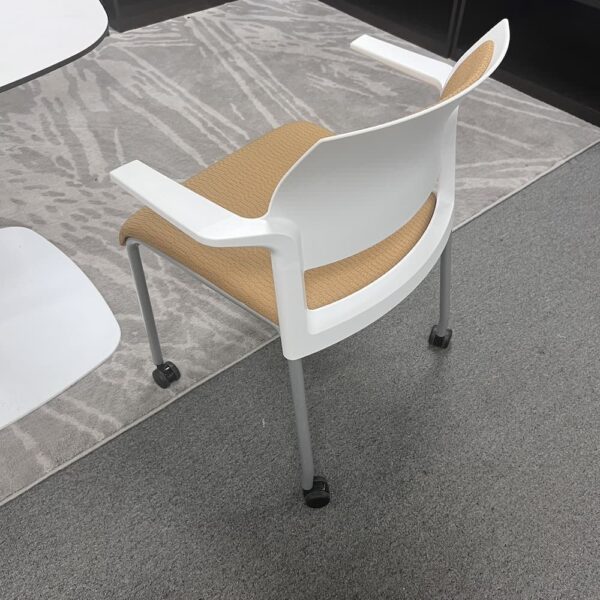 Steelcase move yellow and white rolling stacking chair used