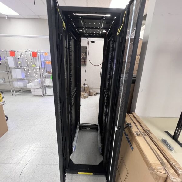 black Tripp lite smart rack server cabinet 24" wide used