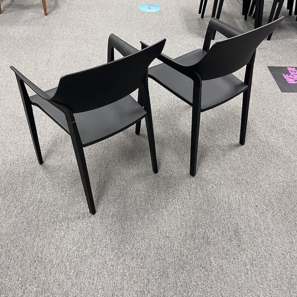 black plastic and black wood stacking chairs lorell brand