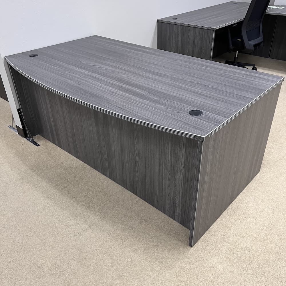 new laminate desk with box box file pedestal bow front shown in Samoa Grey with fluted edges and silver flat handle pulls