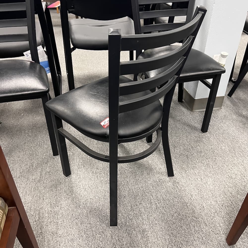 black slat back cafe chair metal with vinyl padded seat used restaurant break room furniture office