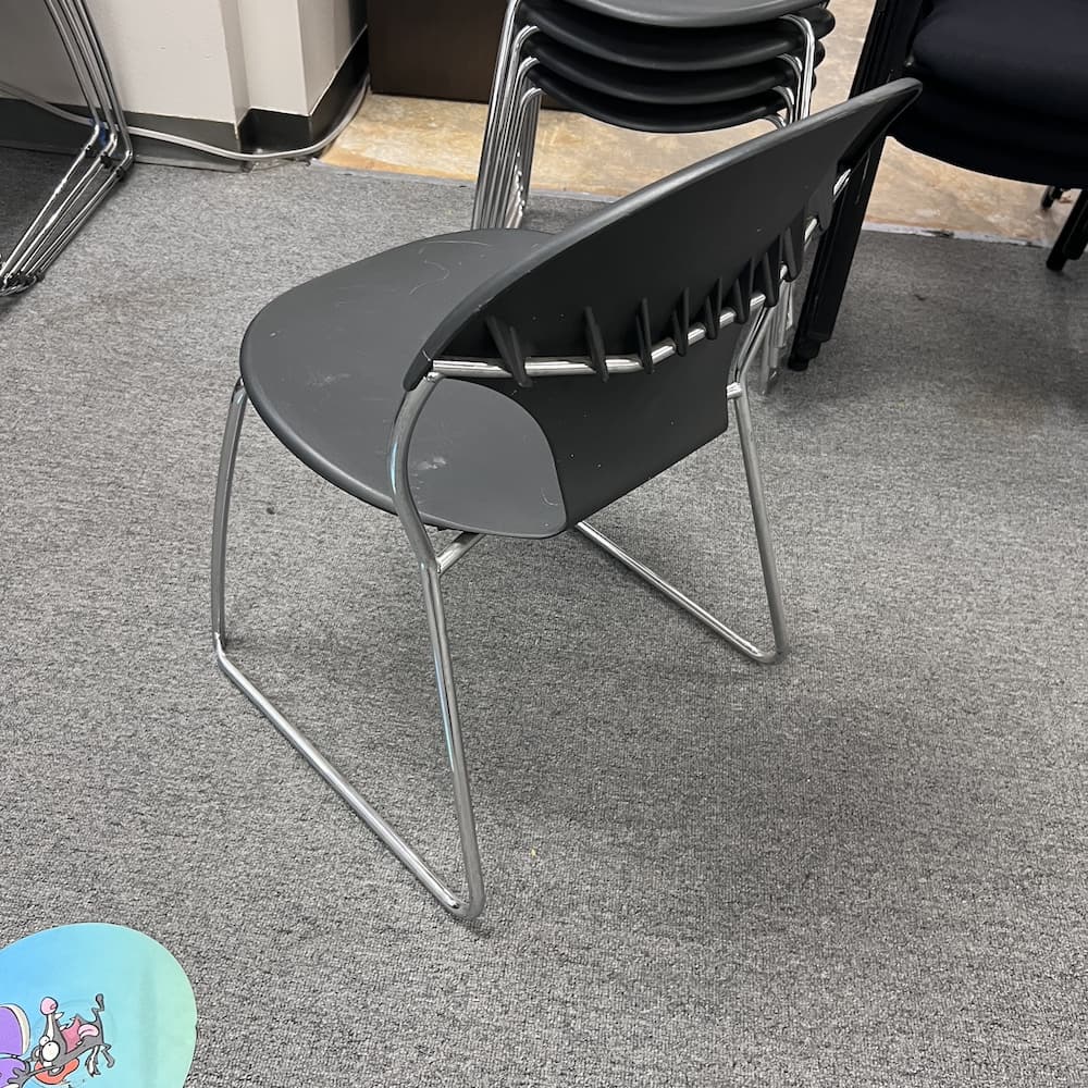 black plastic stacking chair with chrome legs vertsteel chela used