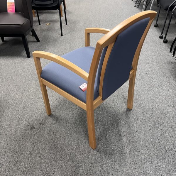 periwinkle blue upholstery guest chair with maple base arms used office chair