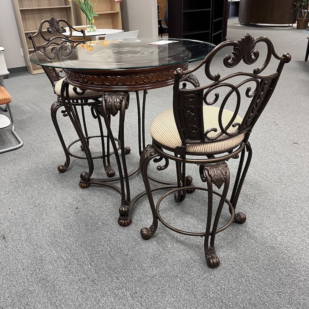 glass round table with two chairs