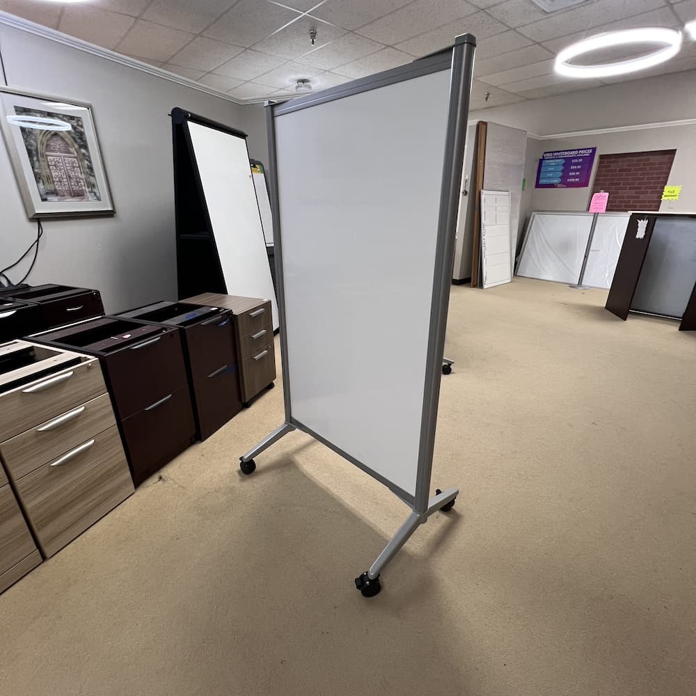 white rolling dry erase board with silver frame