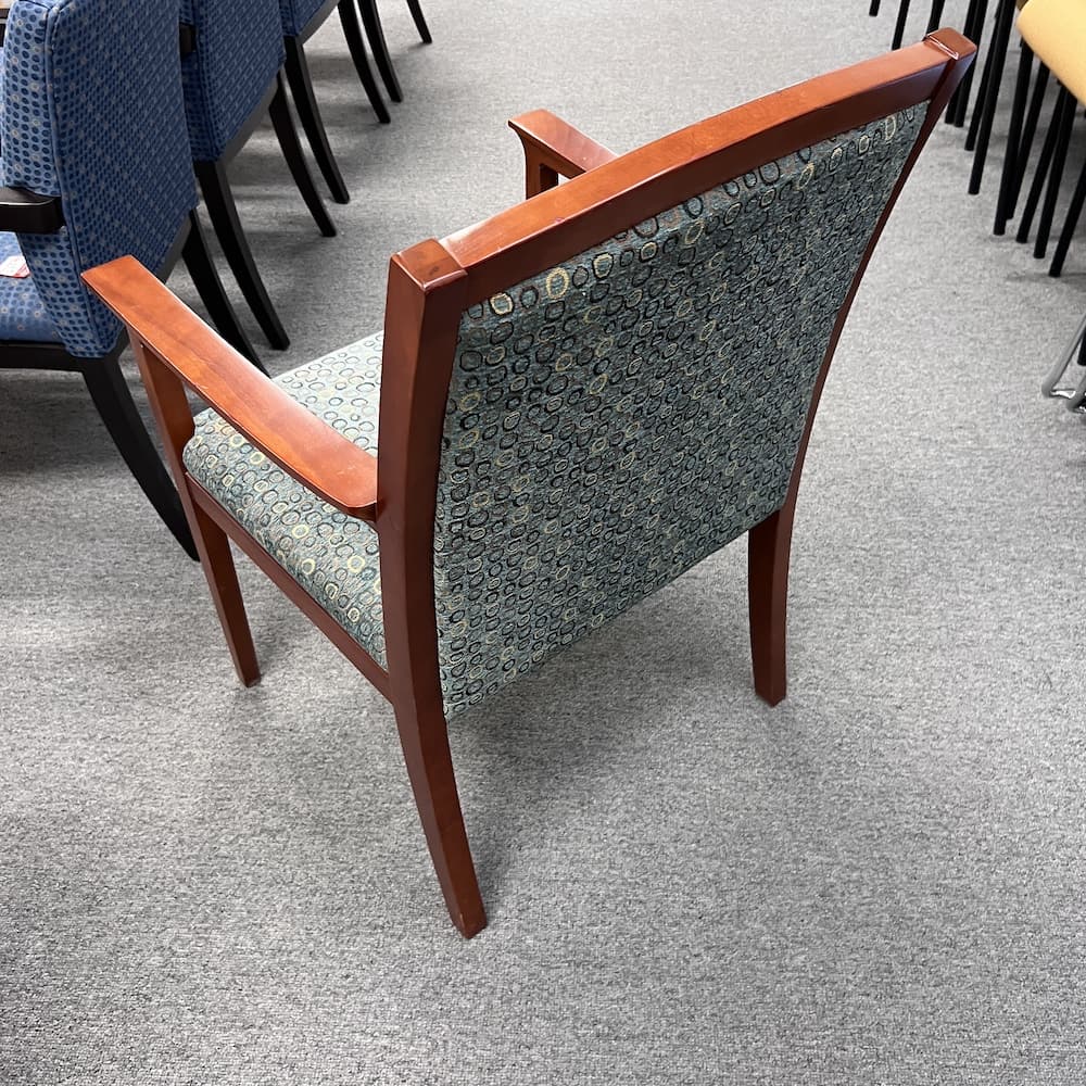 green upholstered guest chair with cherry veneer frames and arms